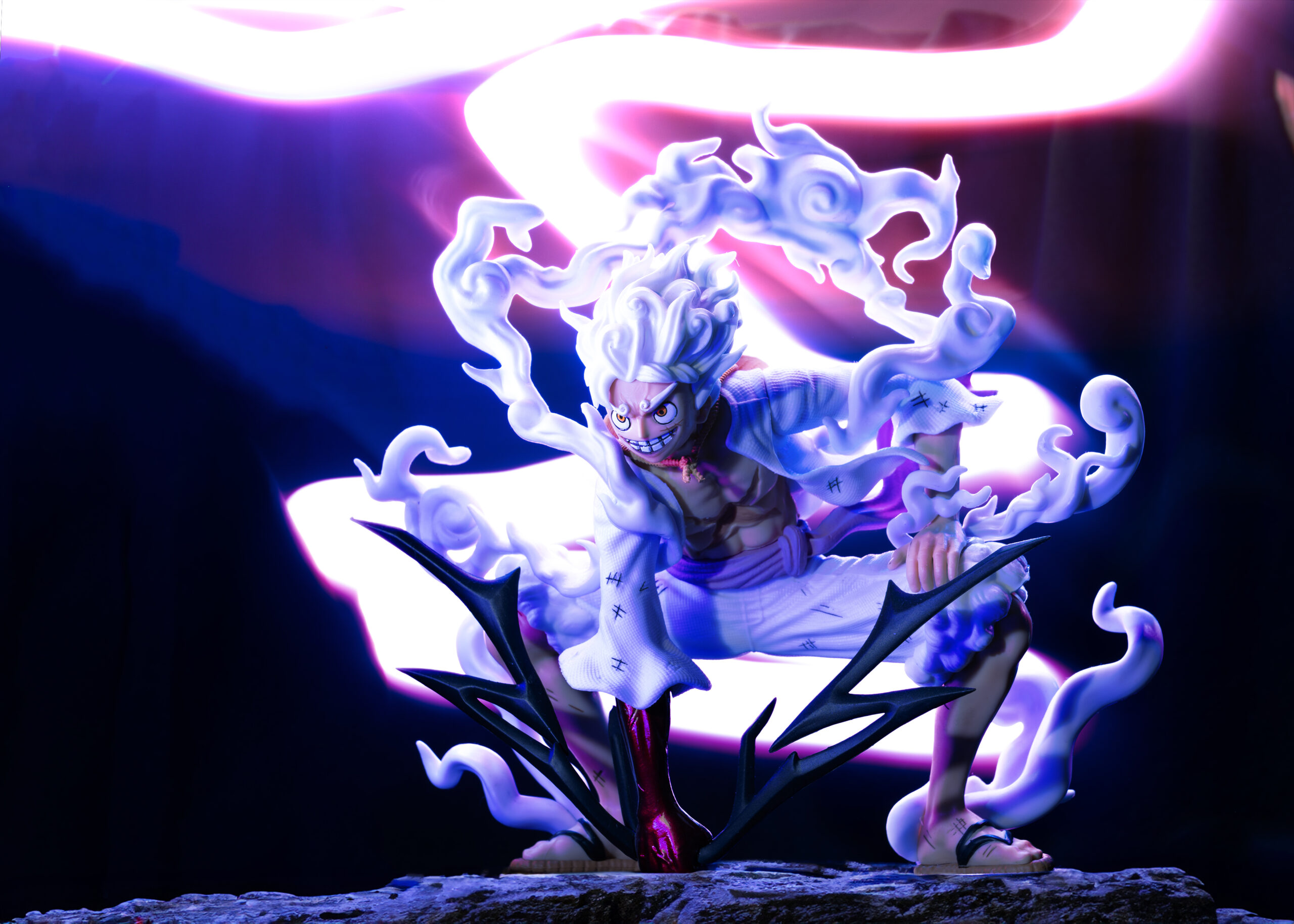 An action figure posing on two knees with a lightning bolt flashing behind it.